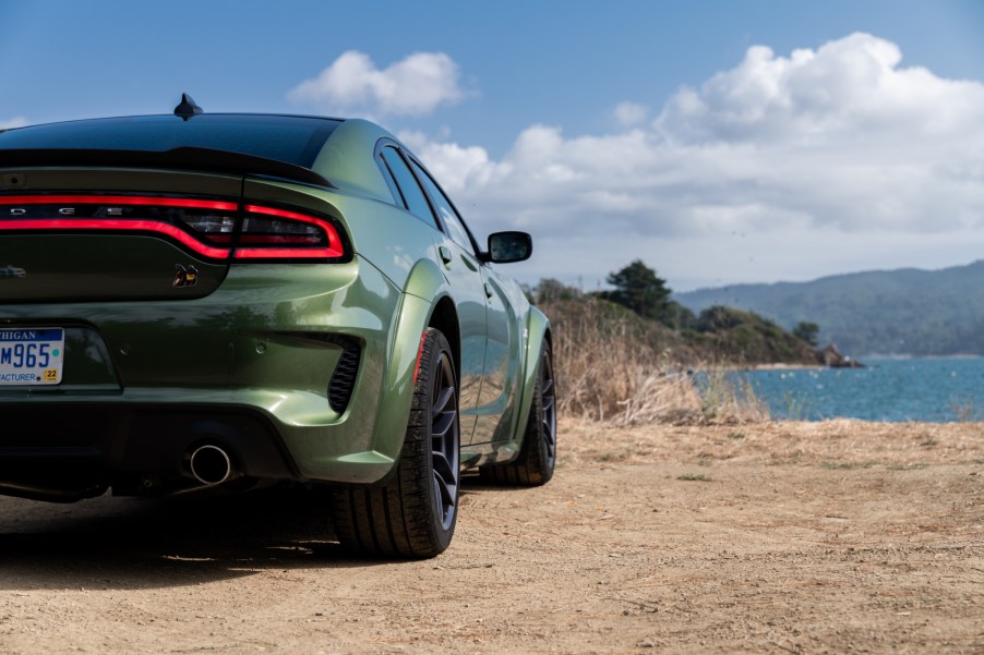 A Green 2020 Dodge Charger facing away toward the water