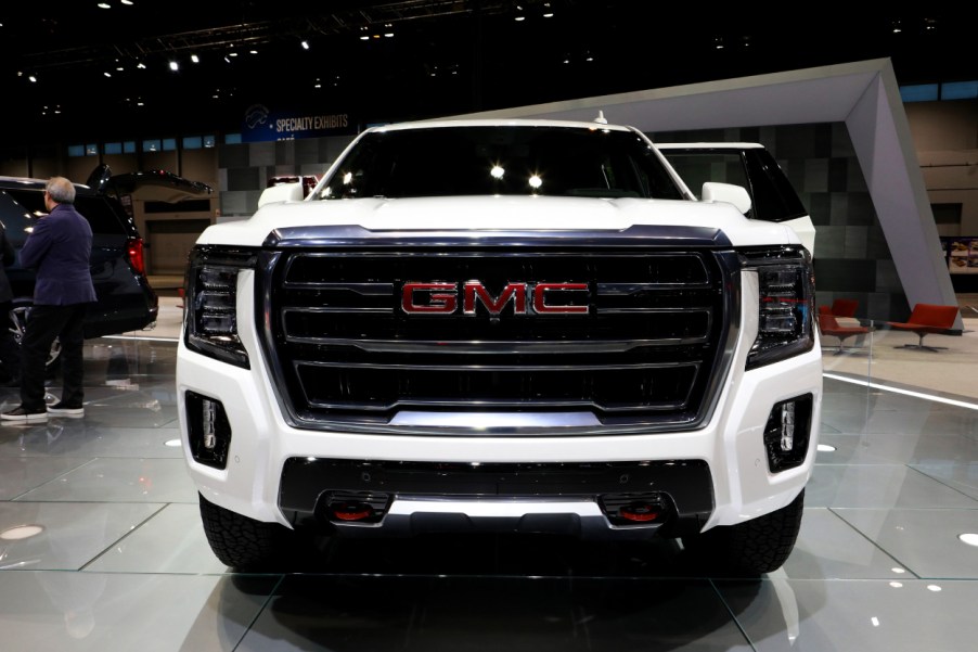 A 2021 GMC Yukon Denali on display at an auto show