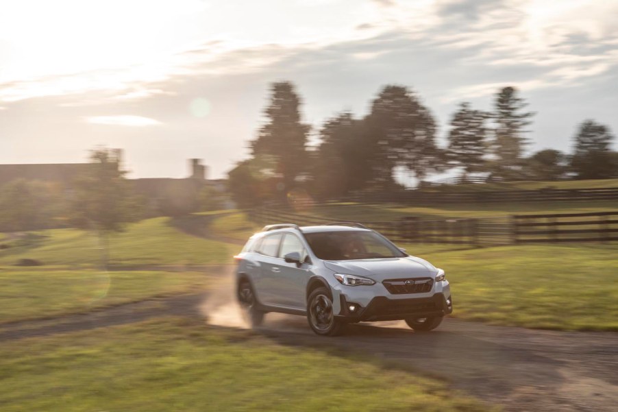 2021 Subaru Crosstrek driving through a field