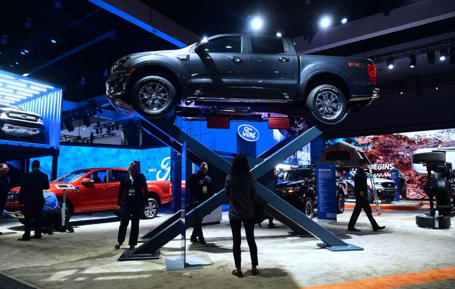 A Ford Ranger on a raised display at an auto show