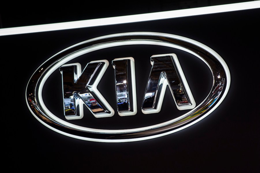 A close up image of the Kia logo.