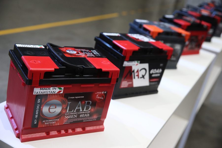 Several red car batteries