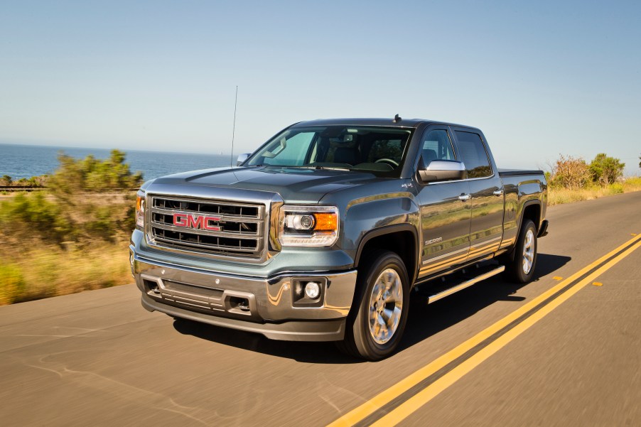 2014 GMC Sierra 1500 rolling down the road