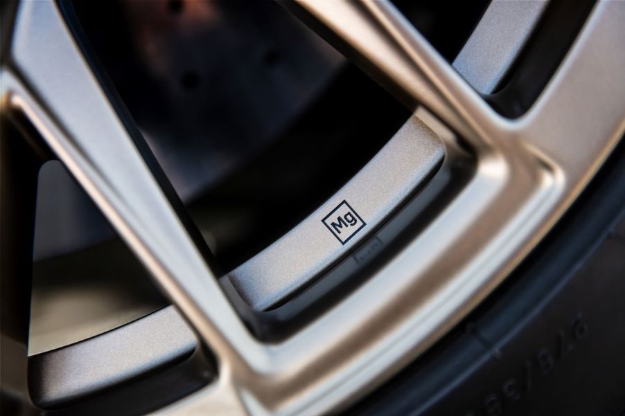 A close-up of the 2022 Cadillac V-Series Blackwing gold-colored magnesium wheel