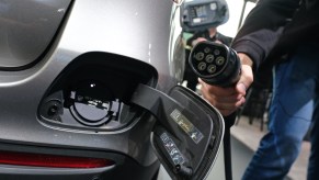 A Mercedes-Benz EV being plugged in