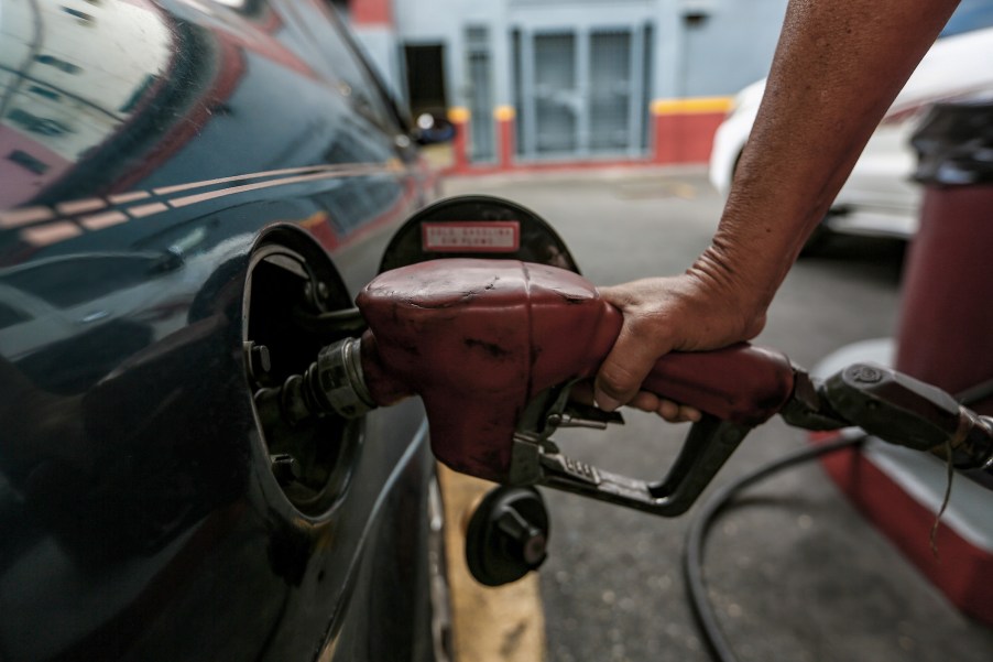 A car is refuelled at a filling station during the ongoing fuel shortage.