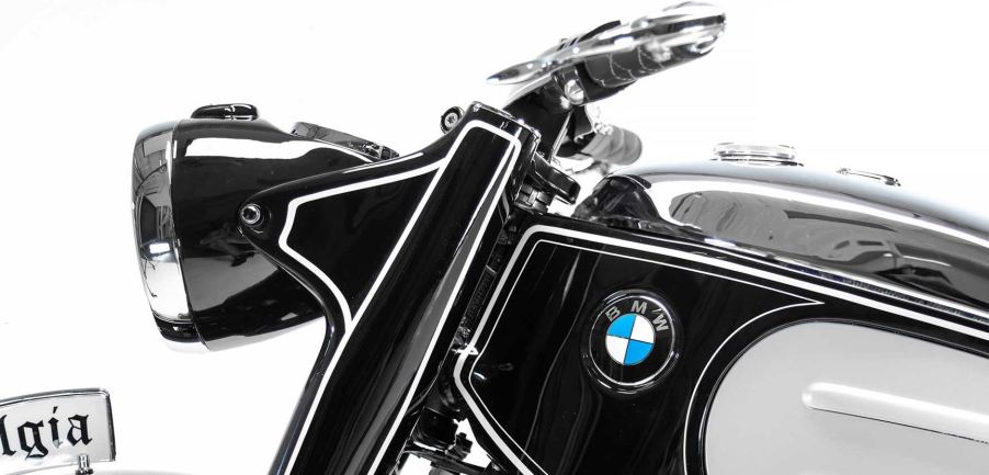 The forks, headlight, and handlebars of a custom BMW motorcycle