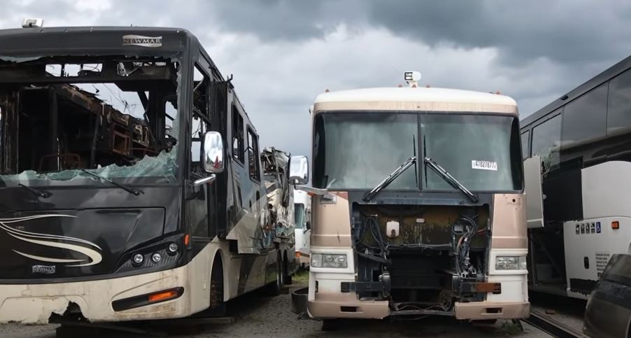 Motorhomes at an RV salvage yard