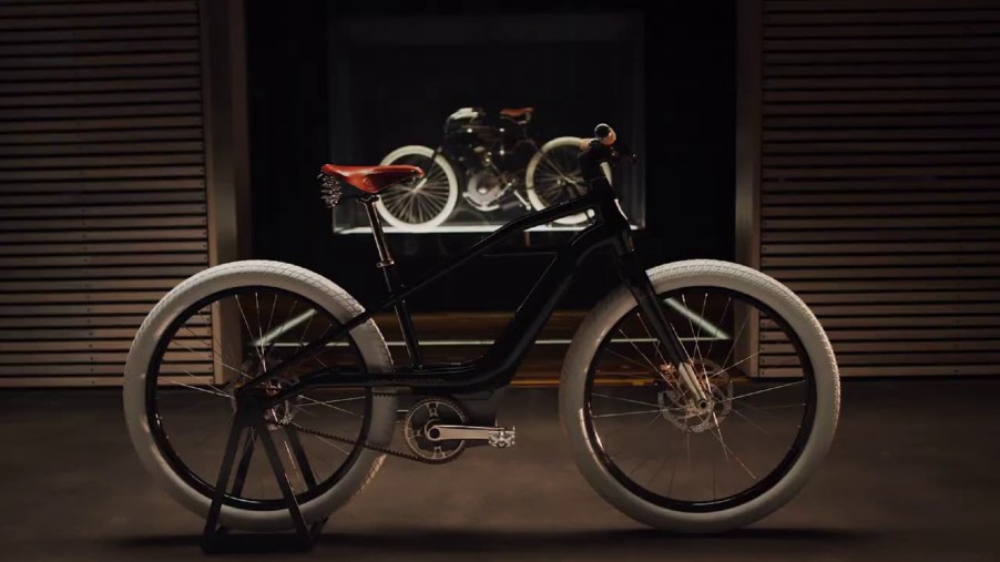 The Harley-Davidson Serial 1 e-bike in front of the Serial One motorcycle