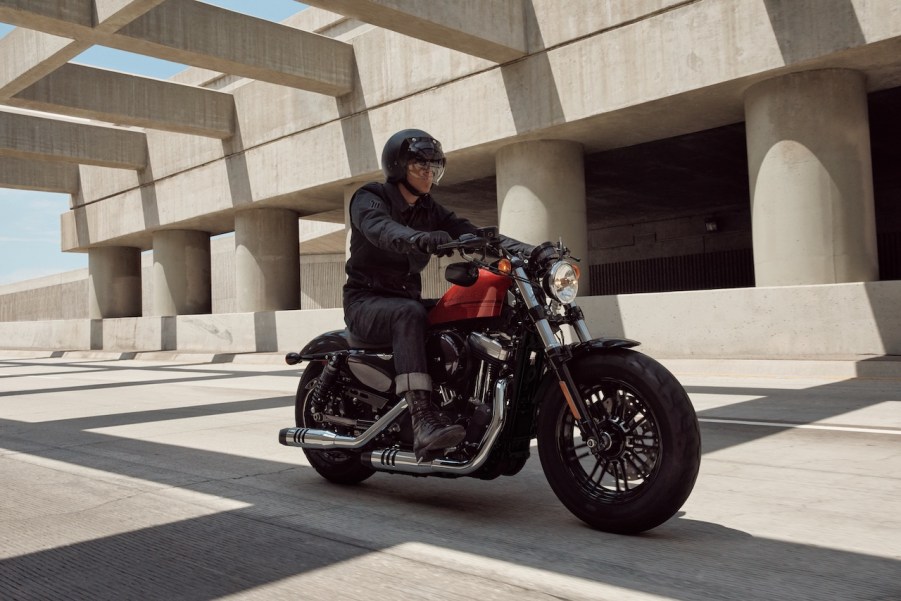 A photo of a Harley-Davidson Sportster on the road.