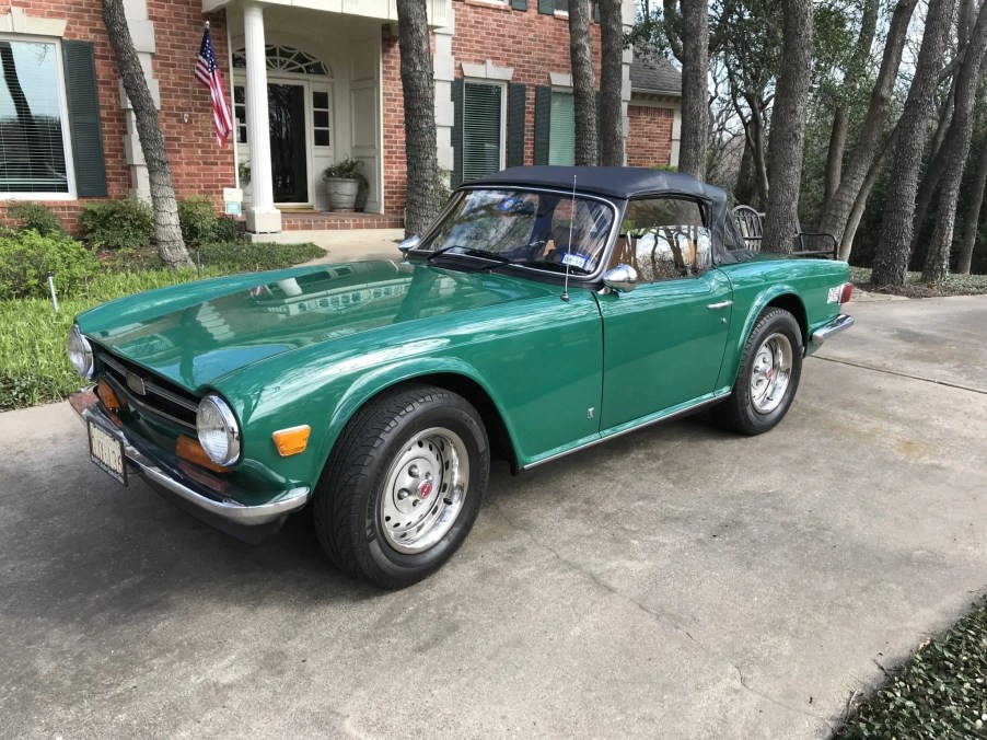 A green 1974 Triumph TR6