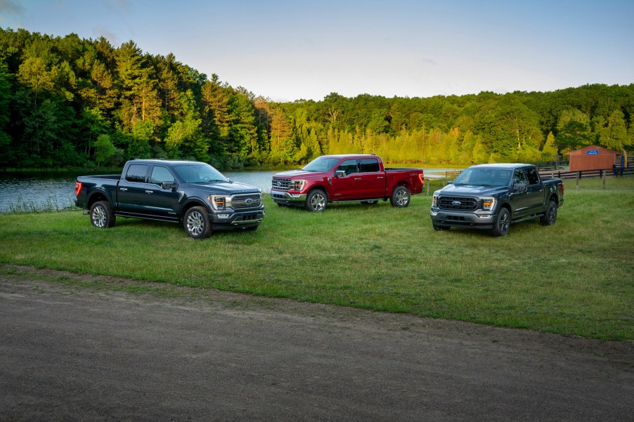 All-new F-150 Limited in Smoked Quartz Tinted Clearcoat (left), F-150 Lariat in Rapid Red Metallic Tinted Clearcoat, and F-150 XLT Sport Appearance Package in Carbonized Gray