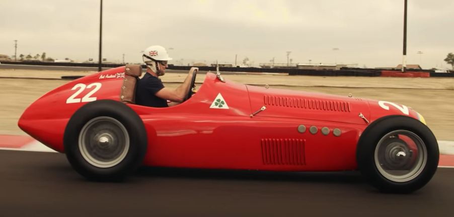 A profile view of a red Alfa Romeo racecar