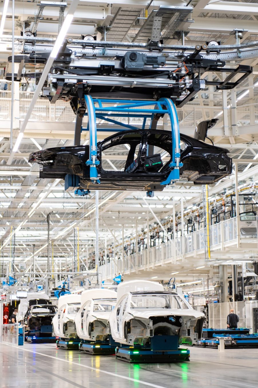 Car bodies of the new S-Class Mercedes-Benz passenger car queue at the new "Factory 56" assembly line at the Mercedes-Benz manufacturing plant | Lennart Preiss/Getty Images