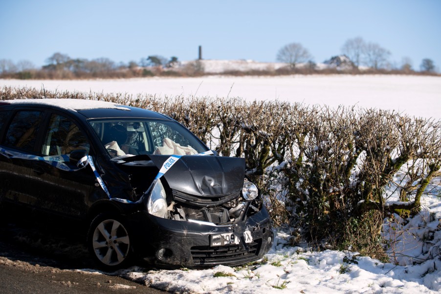 A crashed black car