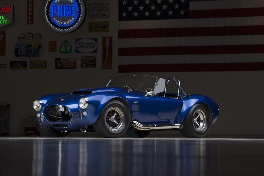 The blue 1966 Shelby Cobra 427 Super Snake in a dimly-lit garage