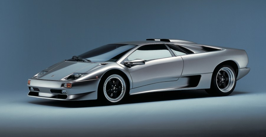 An image of a gray Lamborghini Diablo SV in a studio.