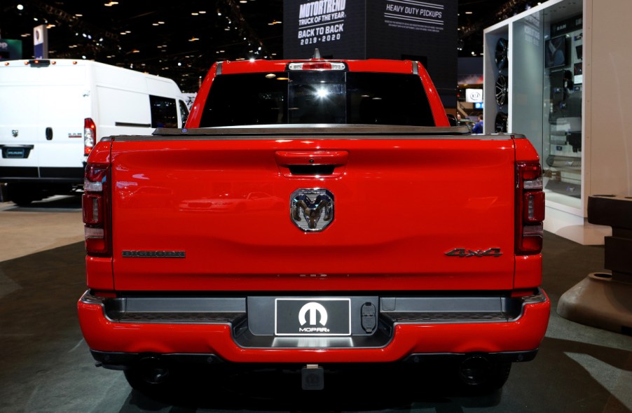 A red Ram 1500 on display at an auto show