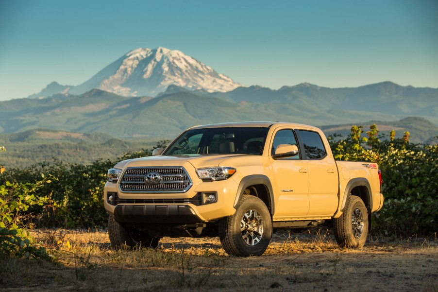 2016 Toyota Tacoma parked in front of a mountain