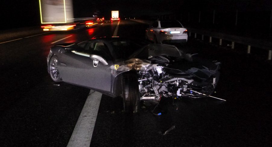 An image of a crashed Ferrari F8 Tributo out on a street.