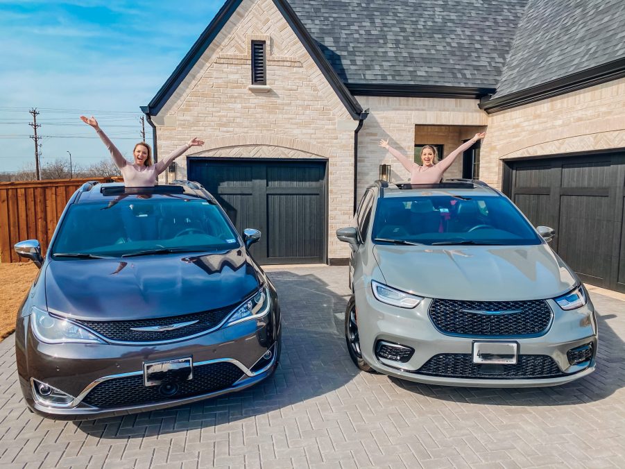 two moms with their pacifica minivans side by side posing out of the sun roofs