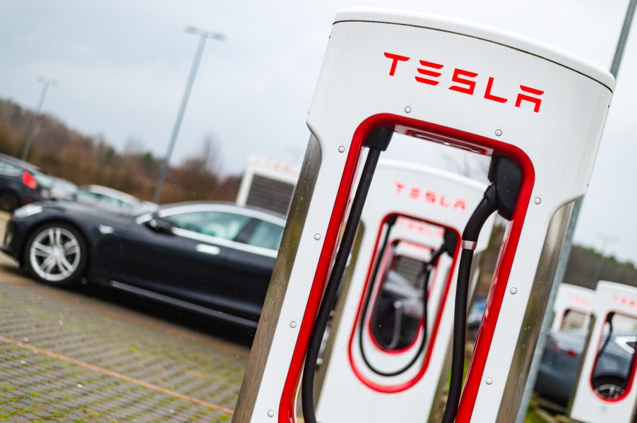 A row of Tesla superchargers at a station