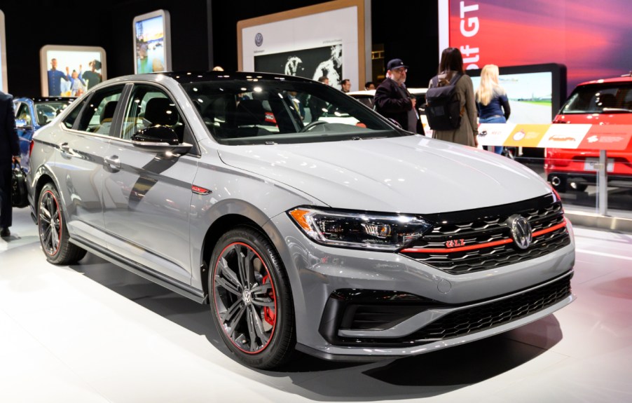 A Volkswagen Jetta on display at an auto show