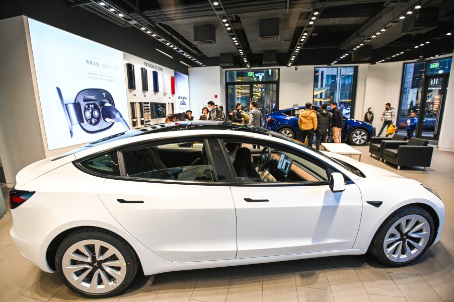 A white Tesla Model 3 at a Tesla flagship store on January 4, 2021, in Shanghai, China