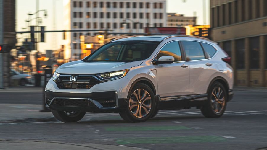 The 2021 Honda CR-V Hybrid driving in the city