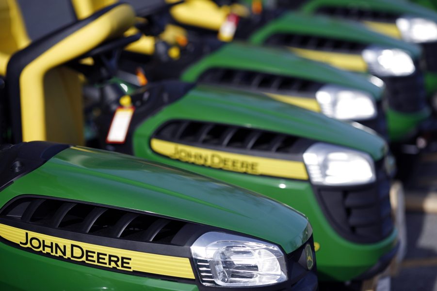 Deere Co. John Deere brand riding lawnmowers are displayed for sale outside a Lowe's Cos. store in Louisville, Kentucky, U.S.