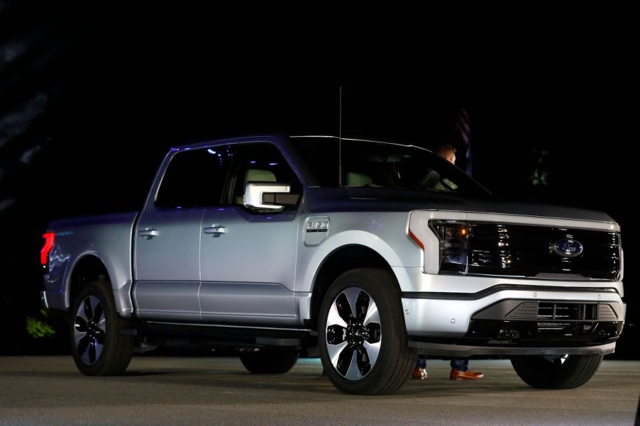 A 2022 Ford F-150 Lightning electric pickup truck parked outside Ford's headquarters in Michigan in May 2021