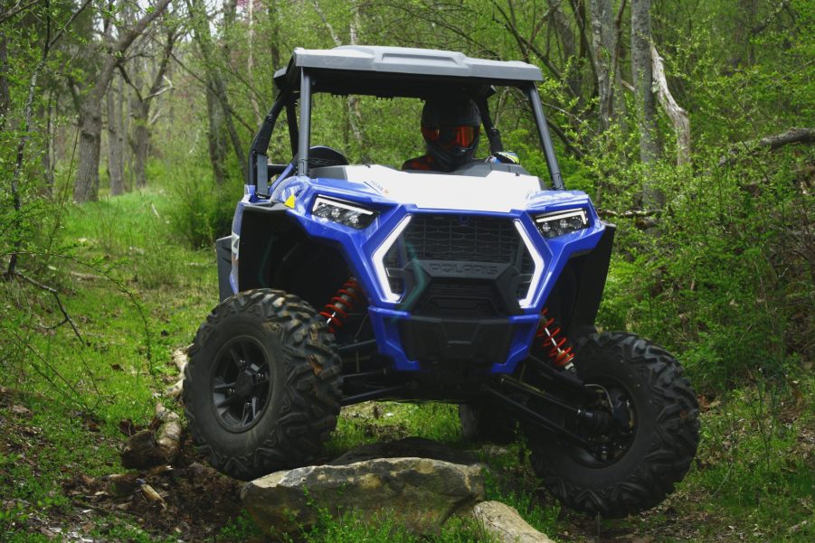 2021 Polaris RZR Trail S Sport ripping through a wooded trail