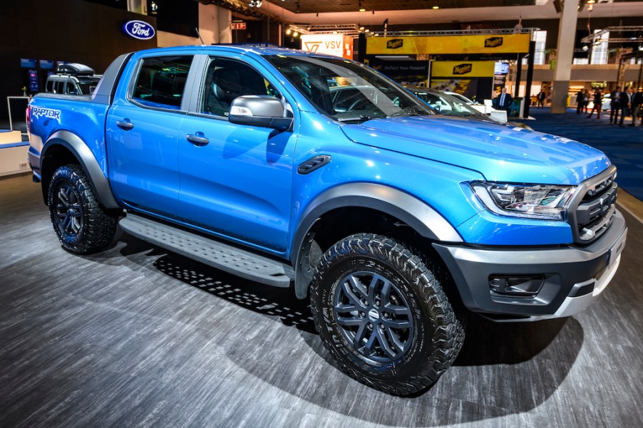 A blue ford f-150 raptor