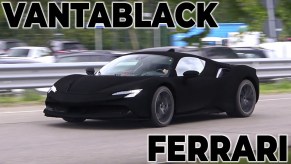 a Ferrari SF90 in Vantablack caught driving in Italy