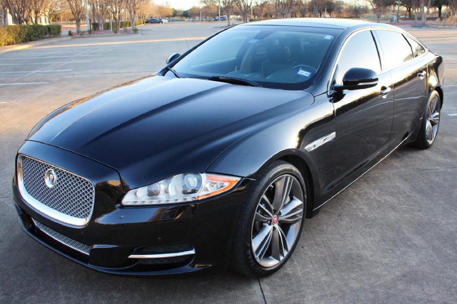 A black 2012 Jaguar XJL Supercharged in a parking lot