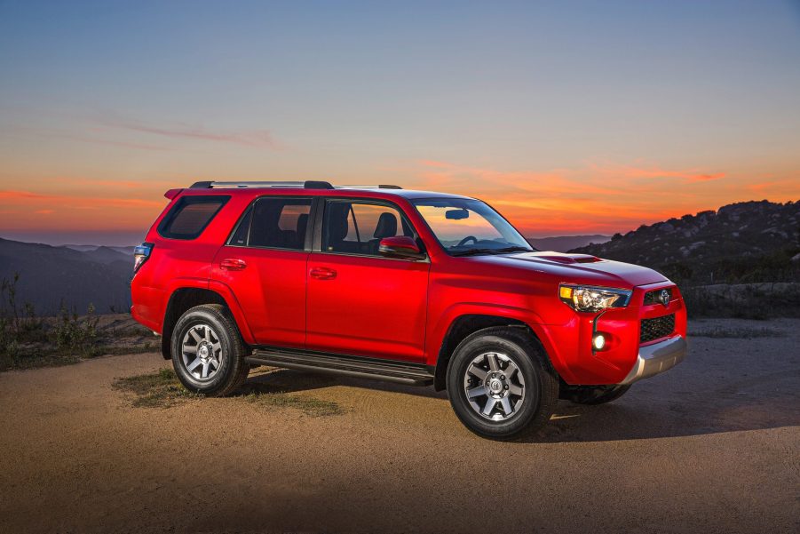 A red Toyota 4Runner at sunset