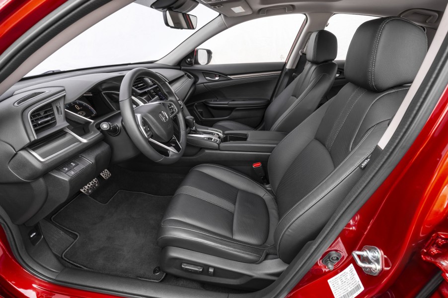 The dark-gray interior of a red 2021 Honda Civic Sedan Touring