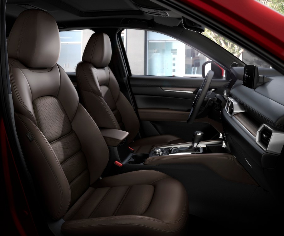 Black synthetic leather and suede front seats in a 2021 Mazda CX-5 compact SUV