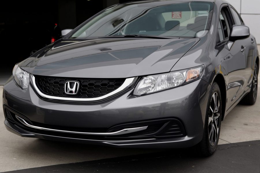 A grey Honda Civic parked streetside