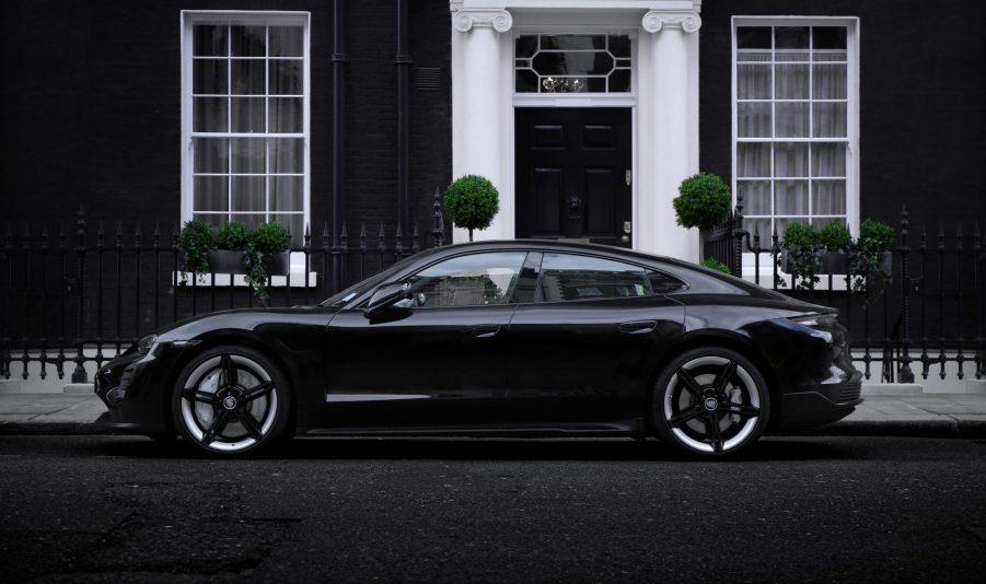 The black Porsche Taycan in Mayfair, London. The Taycan is Porsche's first series production electric car.