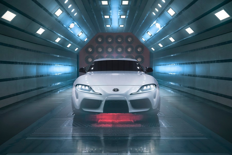 A white A91 Supra CF front facing in a wind tunnel