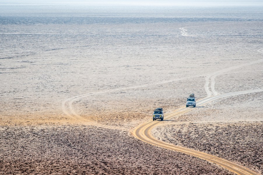 A group of Toyota Land Cruiser SUVs