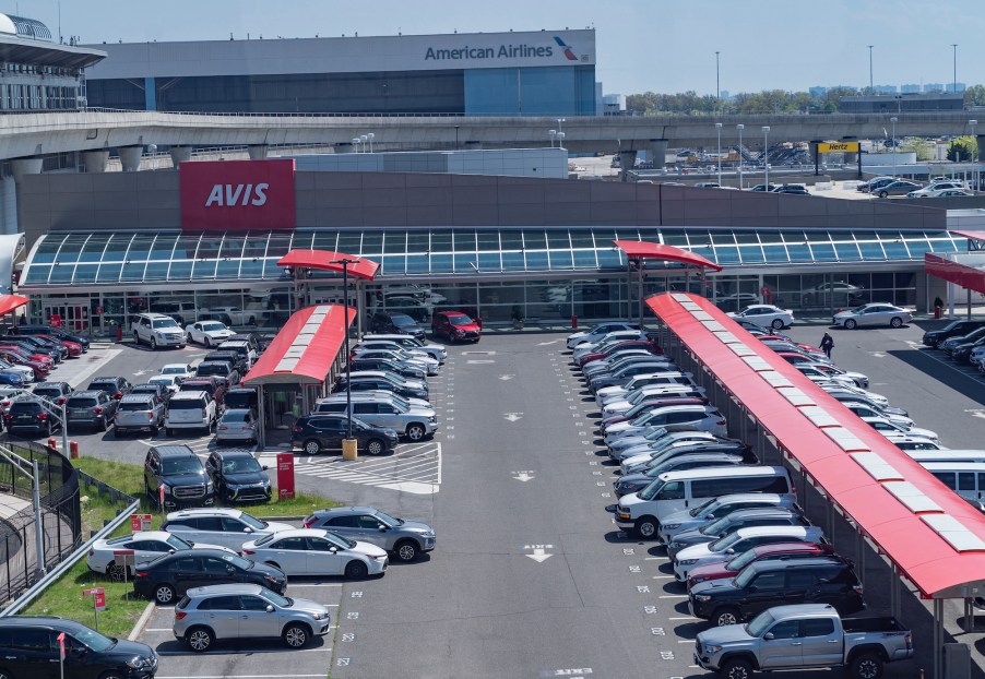 An Avis rental car parking lot is full because there were no customers during the COVID-19 pandemic at JFK Airport