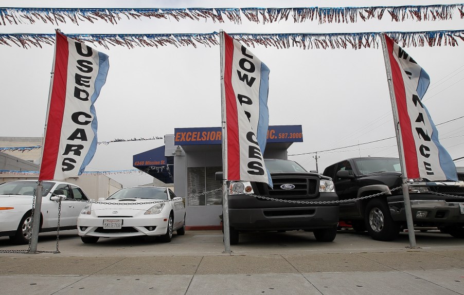 Used cars on display on a sales lot. These cars are getting more desirable as used car prices soar