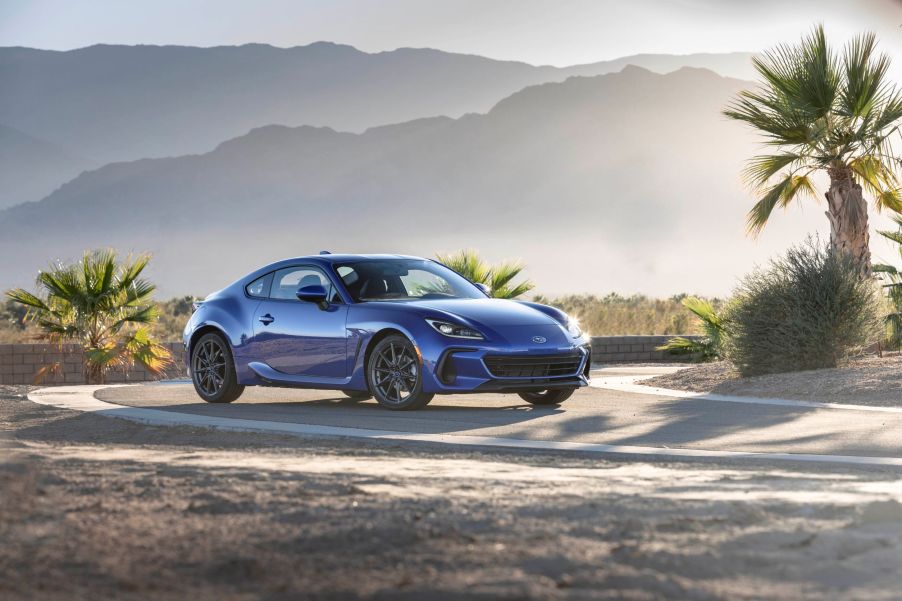 A blue 2022 Subaru BRZ on a desert racetrack