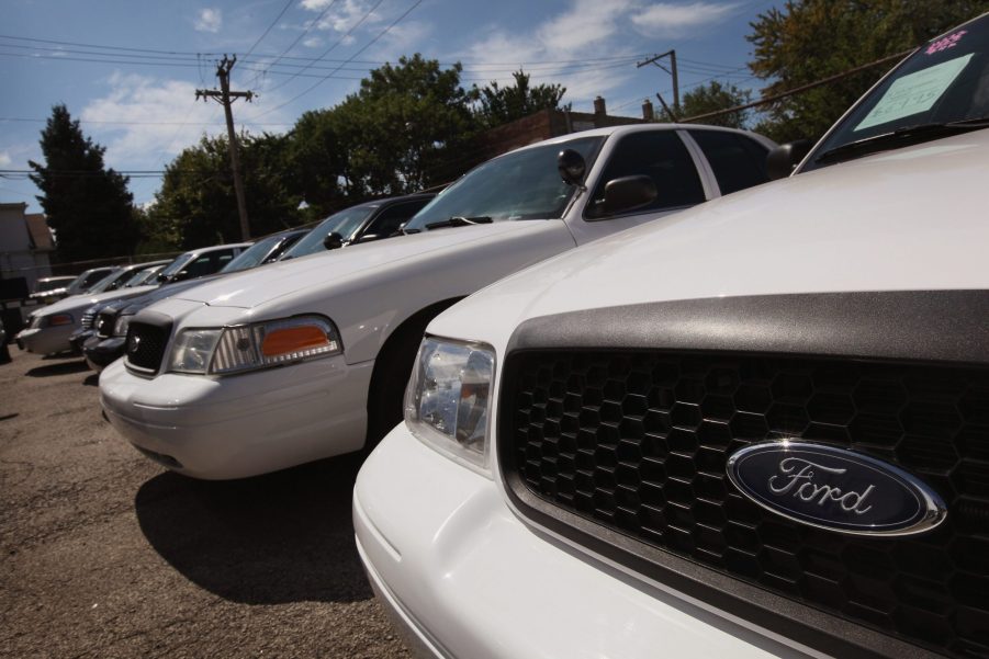 Ford Crown Victorias parked at auction