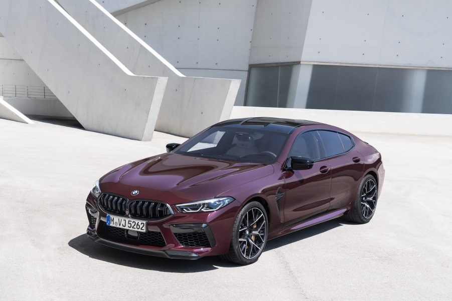 A high-angle photo of a maroon BMW M8 GC