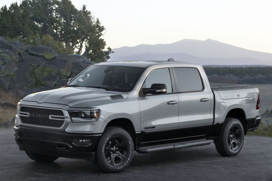 A grey 2022 Ram 1500 BackCountry Edition parked in front of a mountain view