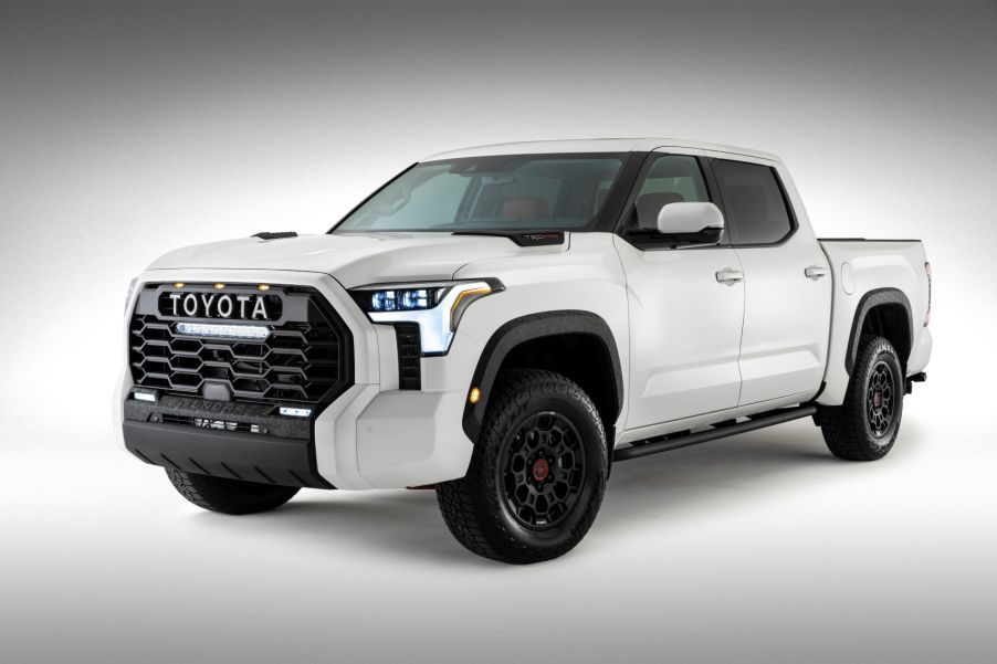 A white 2022 Toyota Tundra on a white background with a black vignette.