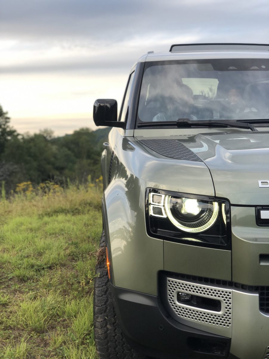 upclose shot of the headlight and front fascia of a new Land Rover Defender